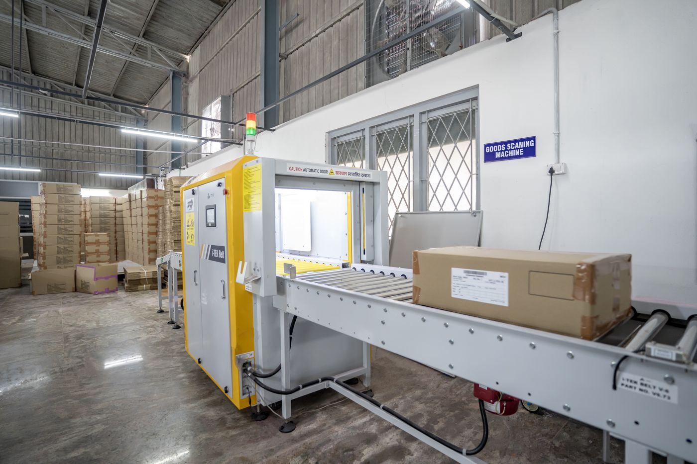 Cartons passing through a needle detection machine